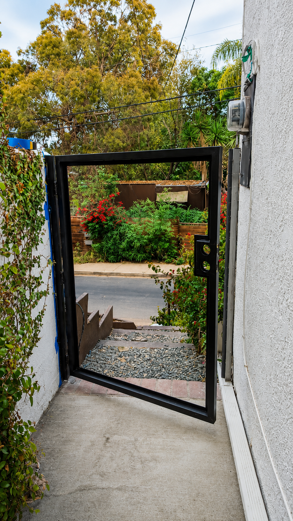Custom steel frame pedestrian gate open view - side yard entrance with composite panel in Los Angeles - ProHands Handyman