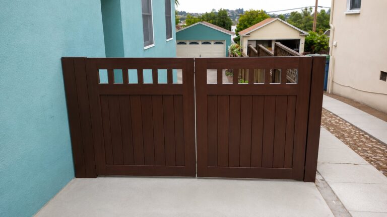 Stained Craftsman wood double driveway gate in Los Angeles