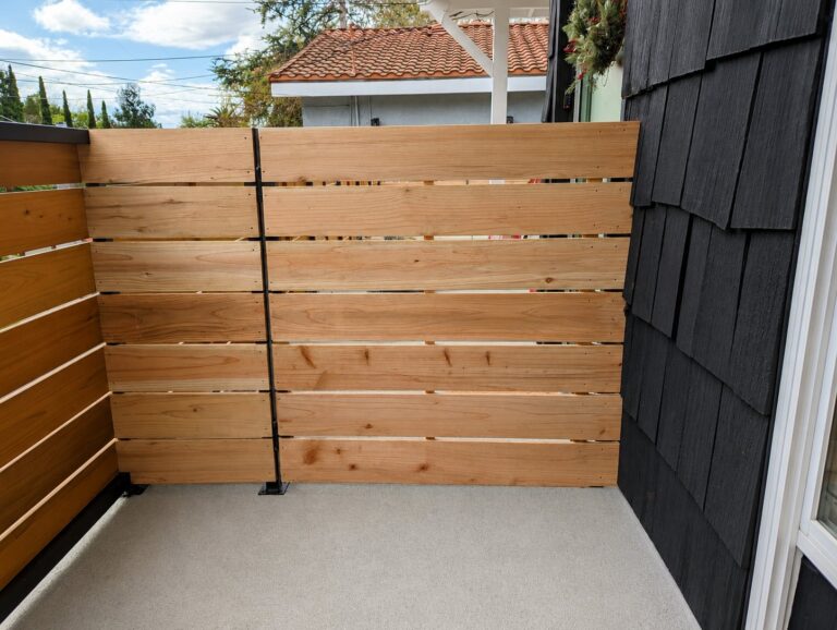 Corner detail meeting the dark shingle wall — Los Angeles