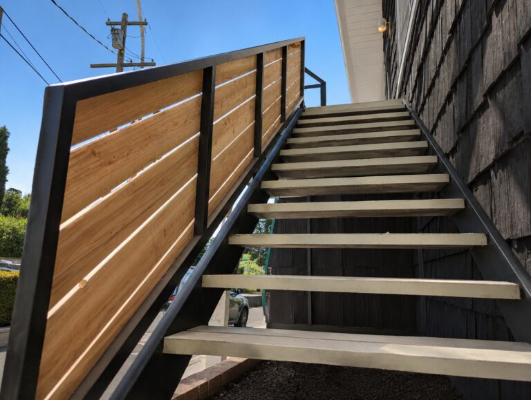 Staircase side screen in matching cedar-and-steel — Los Angeles