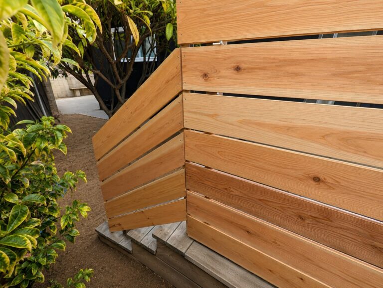 Tight corner detail of the cedar slats and steel frame — Los Angeles