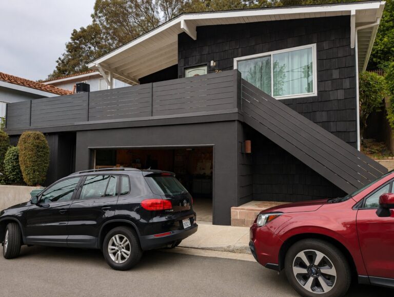 Before — original grey-painted cladding on the upper balcony — Los Angeles