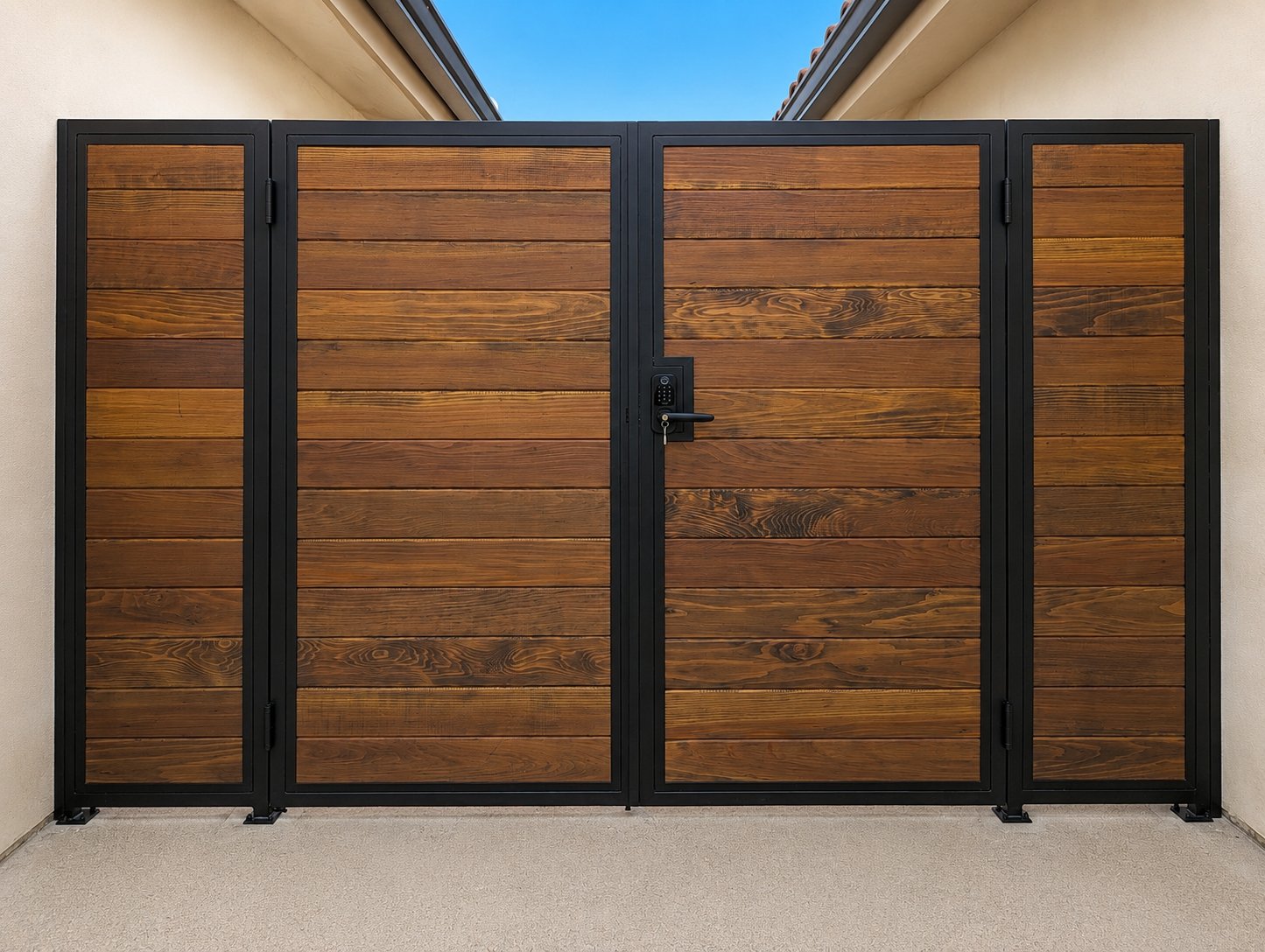 Front-on view of double-leaf steel-frame wood gate with center handle, Los Angeles property