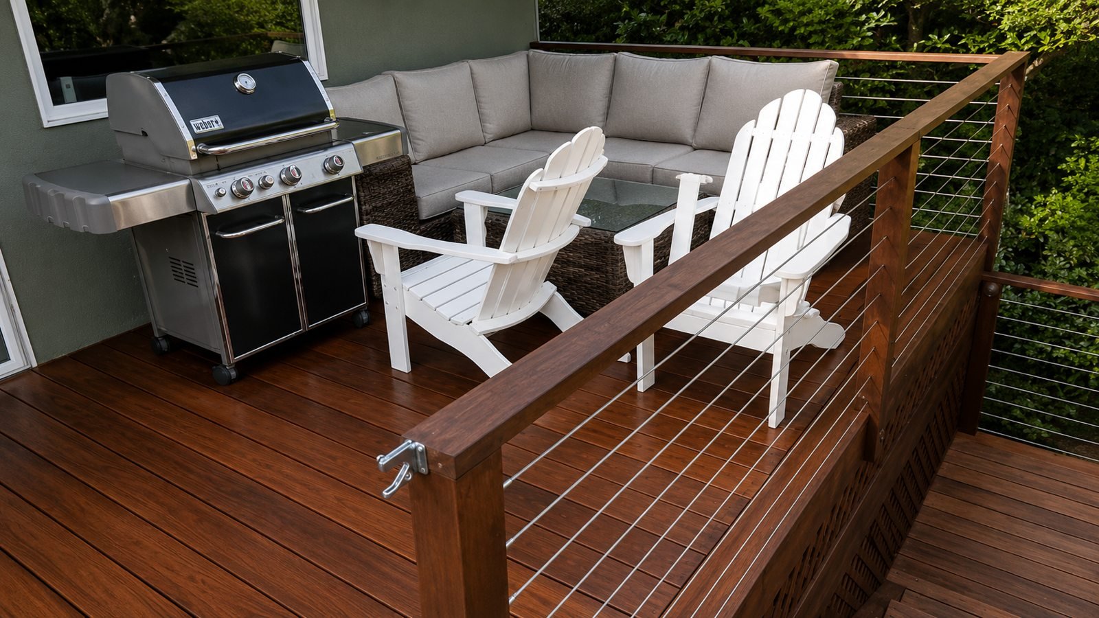 Finished hardwood deck with cable railing, outdoor lounge and grill — Pasadena