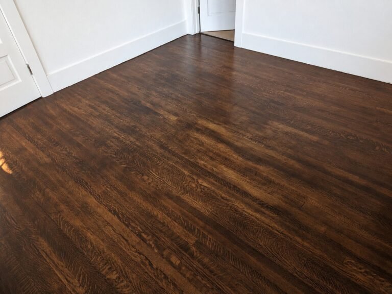 Refinished oak parquet floor with dark stain in Los Angeles interior — ProHands