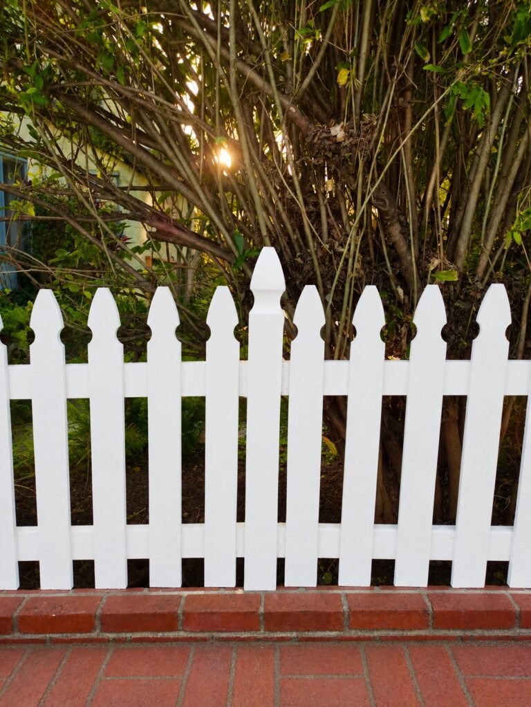 Wood picket fence installation for a Craftsman home in Los Angeles