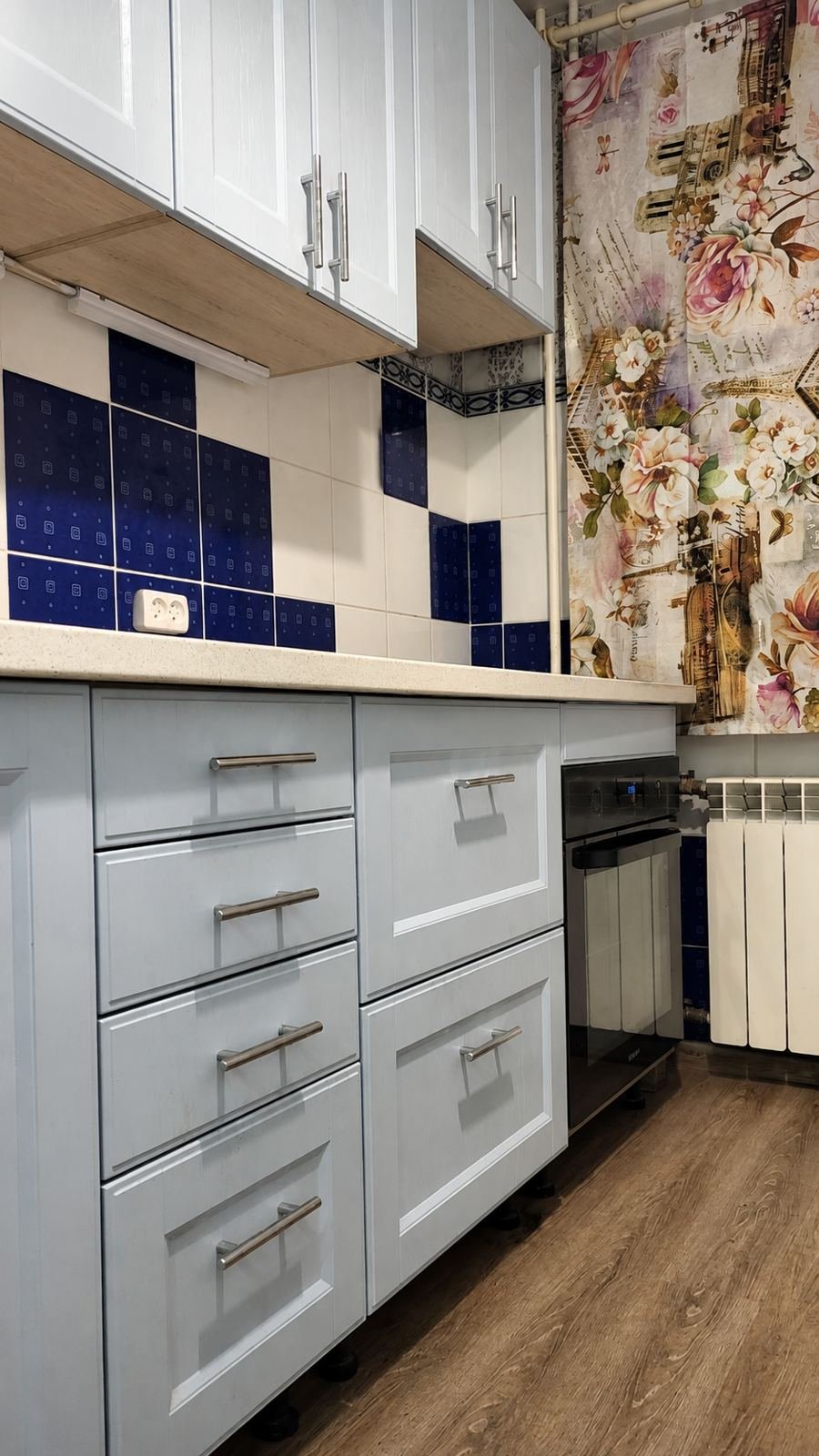 Custom light gray shaker lower kitchen cabinets with deep drawer stack and brushed steel bar pulls in Los Angeles kitchen — ProHands