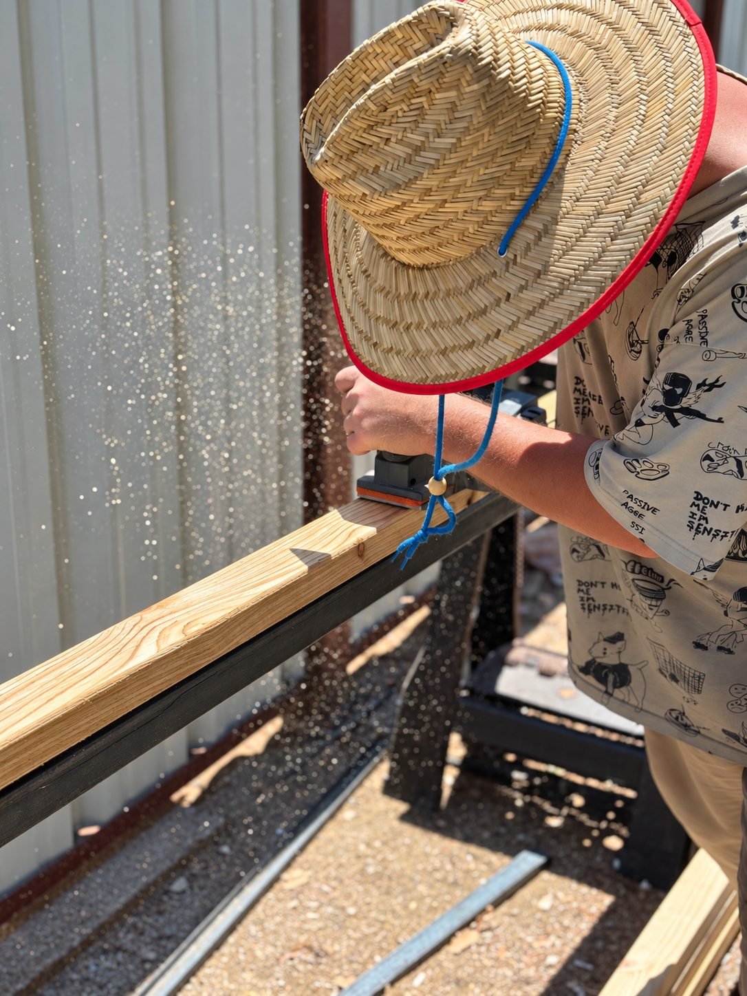 Preparing the redwood section — code-compliant wood near electrical panels